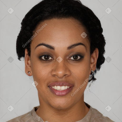 Joyful black young-adult female with short  black hair and brown eyes