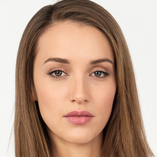 Neutral white young-adult female with long  brown hair and brown eyes