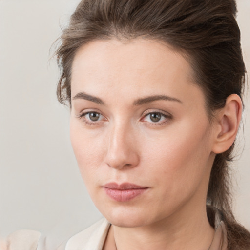 Neutral white young-adult female with medium  brown hair and brown eyes