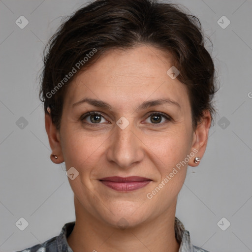 Joyful white adult female with medium  brown hair and brown eyes