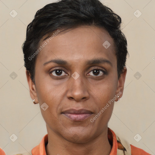 Joyful latino young-adult female with short  brown hair and brown eyes