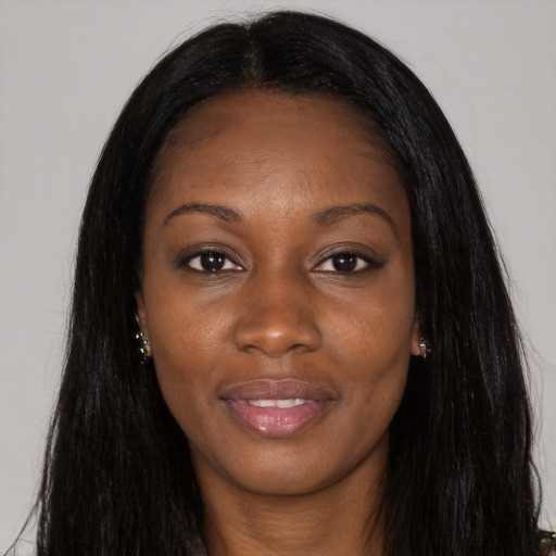 Joyful asian adult female with long  black hair and brown eyes