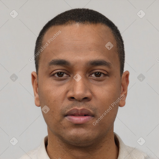Neutral latino young-adult male with short  black hair and brown eyes