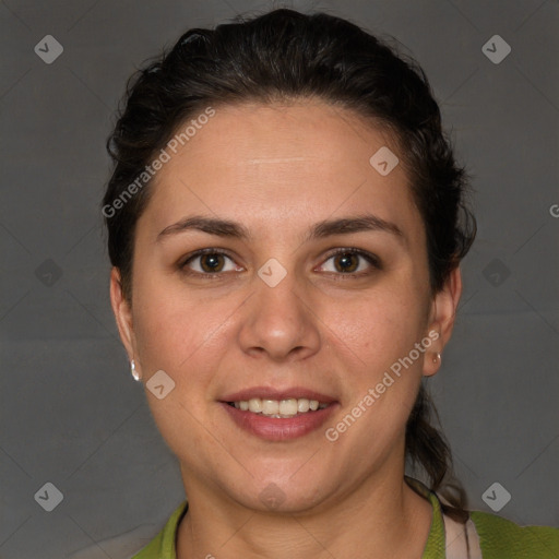 Joyful white adult female with short  brown hair and brown eyes