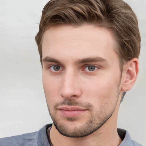 Neutral white young-adult male with short  brown hair and grey eyes