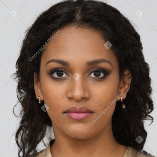 Joyful black young-adult female with long  brown hair and brown eyes