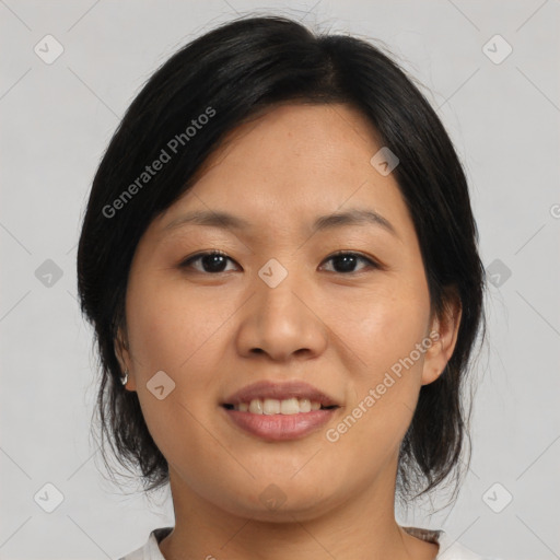 Joyful asian young-adult female with medium  brown hair and brown eyes