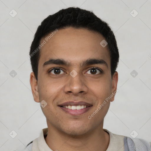 Joyful latino young-adult male with short  black hair and brown eyes