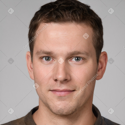 Neutral white young-adult male with short  brown hair and grey eyes