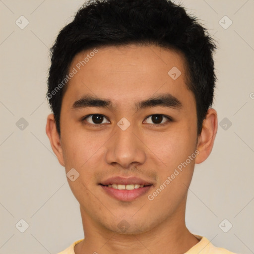 Joyful latino young-adult male with short  brown hair and brown eyes