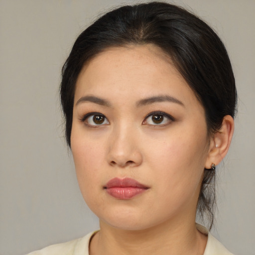 Neutral asian young-adult female with medium  brown hair and brown eyes
