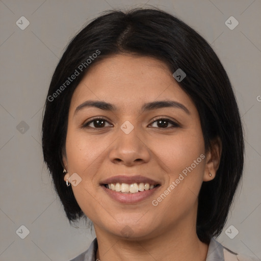 Joyful asian young-adult female with medium  black hair and brown eyes