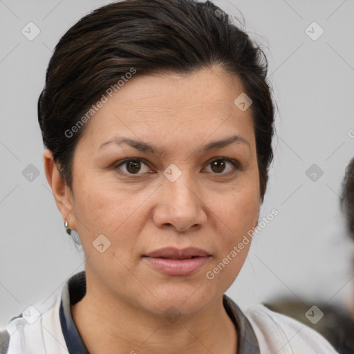 Joyful white adult female with short  brown hair and brown eyes