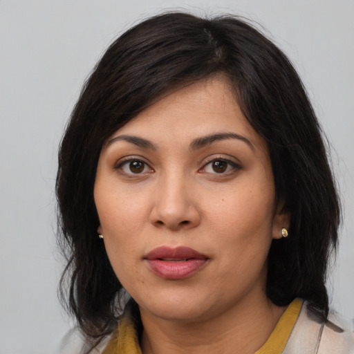 Neutral asian young-adult female with medium  brown hair and brown eyes