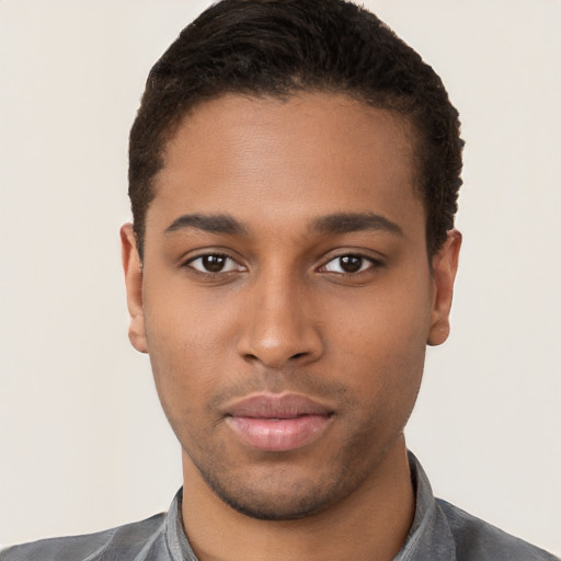 Neutral black young-adult male with short  brown hair and brown eyes