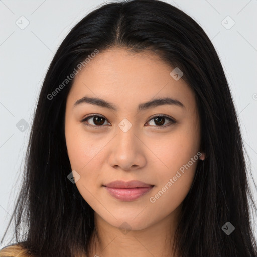 Joyful latino young-adult female with long  brown hair and brown eyes