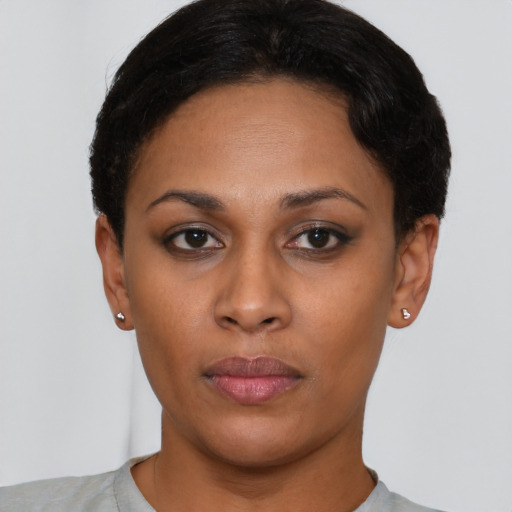 Neutral latino young-adult female with short  brown hair and brown eyes