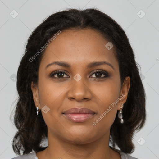 Joyful black young-adult female with medium  brown hair and brown eyes