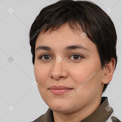 Joyful white young-adult female with short  brown hair and brown eyes