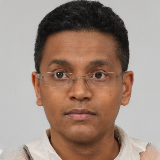 Neutral latino adult male with short  brown hair and brown eyes