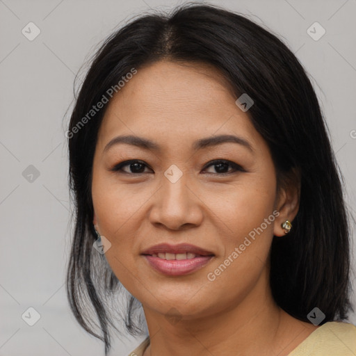 Joyful asian young-adult female with medium  black hair and brown eyes