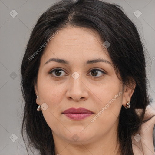 Joyful white adult female with medium  brown hair and brown eyes