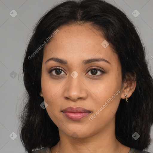 Joyful latino young-adult female with long  brown hair and brown eyes