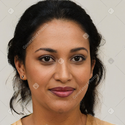 Joyful latino young-adult female with medium  brown hair and brown eyes