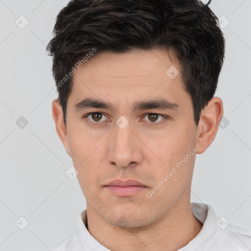 Neutral white young-adult male with short  black hair and brown eyes