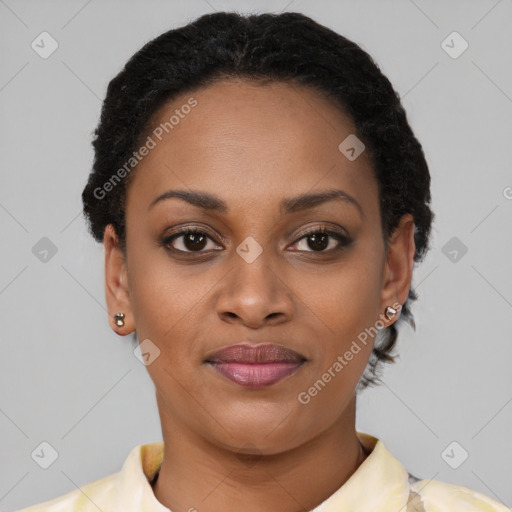 Joyful black young-adult female with short  brown hair and brown eyes