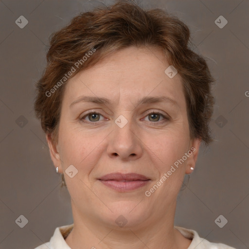 Joyful white adult female with short  brown hair and brown eyes