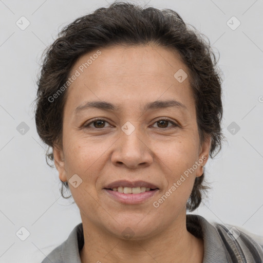 Joyful white adult female with short  brown hair and brown eyes