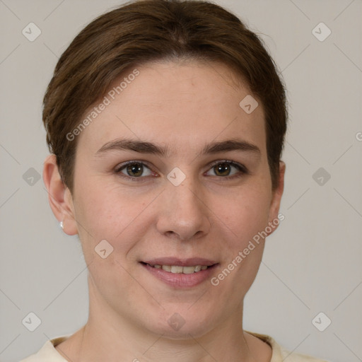 Joyful white young-adult female with short  brown hair and grey eyes