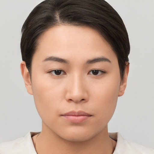 Neutral asian young-adult female with short  brown hair and brown eyes