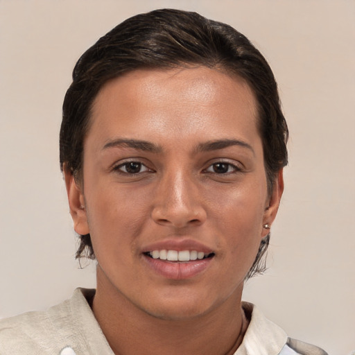 Joyful white young-adult female with short  brown hair and brown eyes