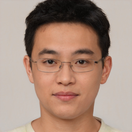 Neutral asian young-adult male with short  brown hair and brown eyes