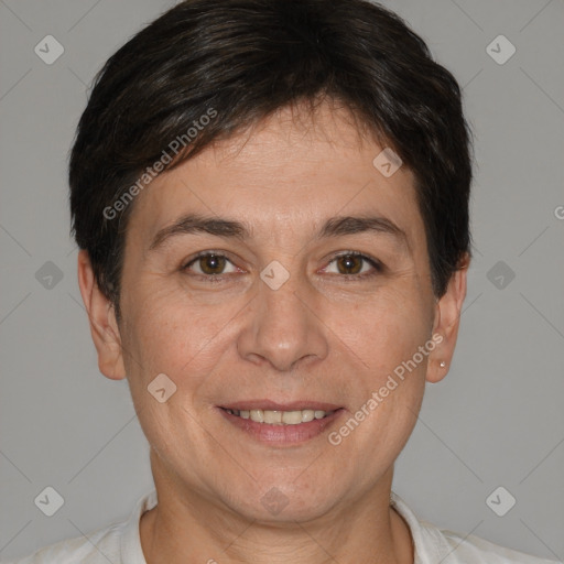 Joyful white adult female with short  brown hair and brown eyes