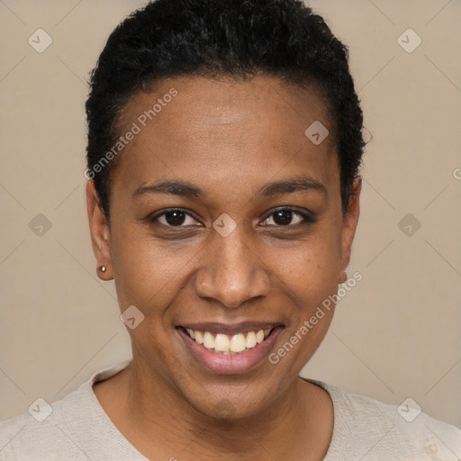 Joyful black young-adult female with short  brown hair and brown eyes