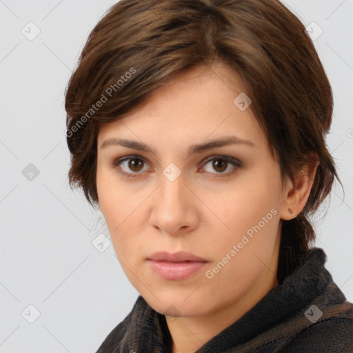 Neutral white young-adult female with medium  brown hair and brown eyes