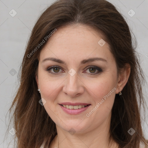 Joyful white young-adult female with long  brown hair and grey eyes