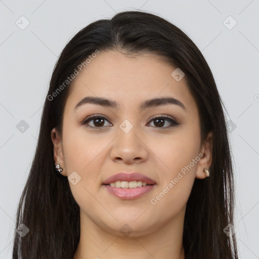 Joyful latino young-adult female with long  brown hair and brown eyes