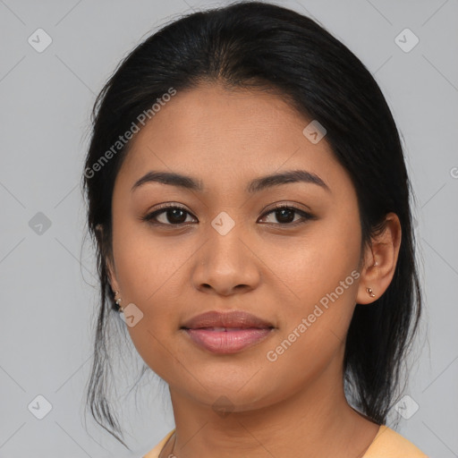 Joyful asian young-adult female with medium  black hair and brown eyes