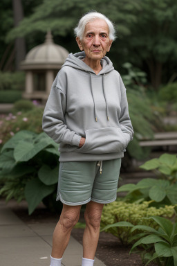 Peruvian elderly non-binary with  gray hair