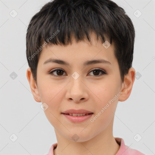 Joyful white child female with short  brown hair and brown eyes