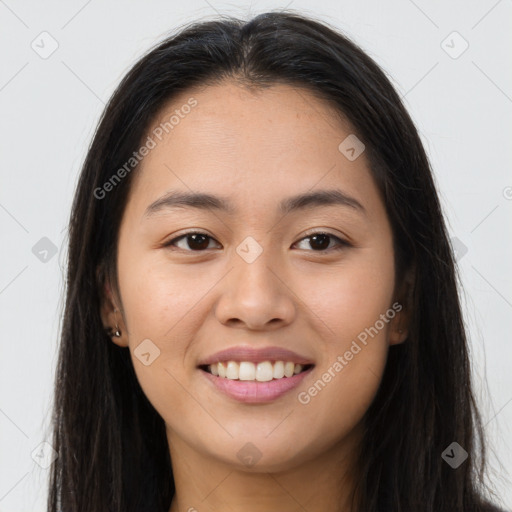 Joyful white young-adult female with long  brown hair and brown eyes