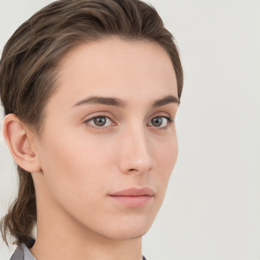 Neutral white young-adult female with short  brown hair and grey eyes