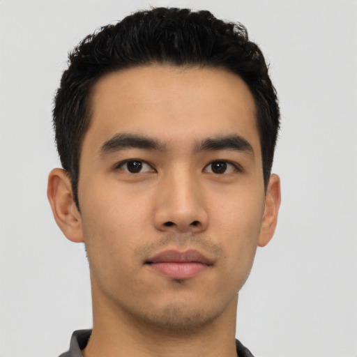 Neutral asian young-adult male with short  black hair and brown eyes