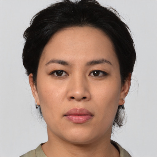 Neutral asian young-adult female with medium  black hair and brown eyes