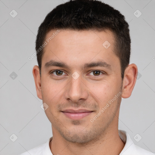 Joyful white young-adult male with short  brown hair and brown eyes