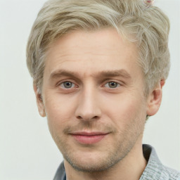 Joyful white adult male with short  brown hair and grey eyes